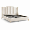 Cama doble tapizada en poliéster beige con patas metálicas doradas